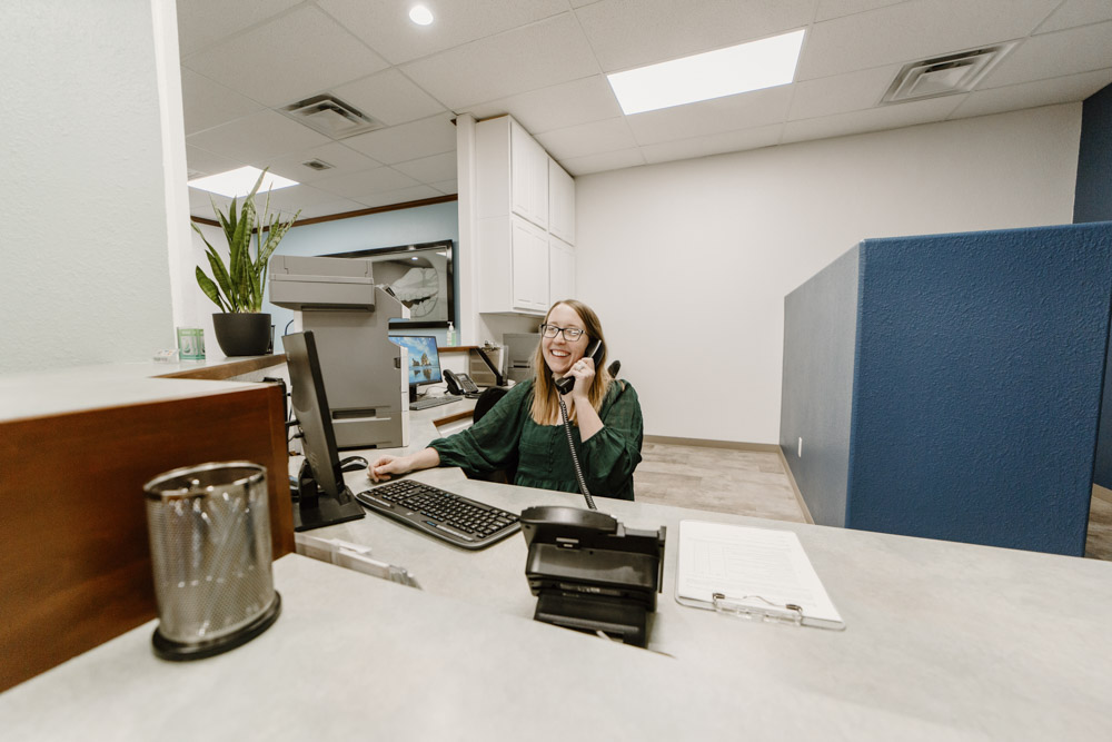 Office manager answering the phone